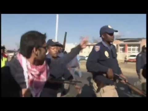 Obama Greets Protesters with Stun Grenades and Rubber Bullets