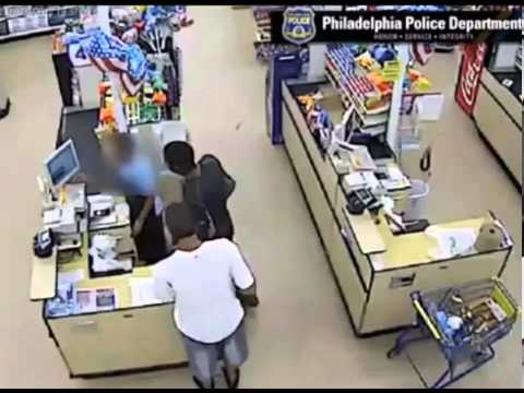 Store Gets Robbed At Gunpoint!!!  CAUGHT ON TAPE!!!!