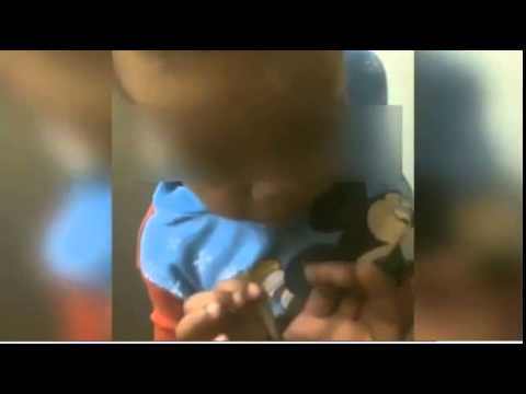 Toddler seen 'smoking marijuana' as 'adults are heard heard laughing' in SHOCKING video